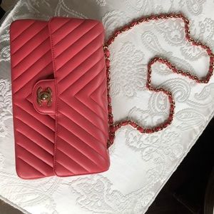Chanel pink lambskin chevron flap bag